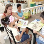 Pauline reading with the children